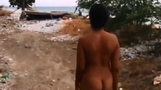 Twerking nude in public beach