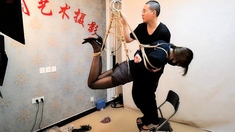 Chinese bondage - Crotch roped & suspended